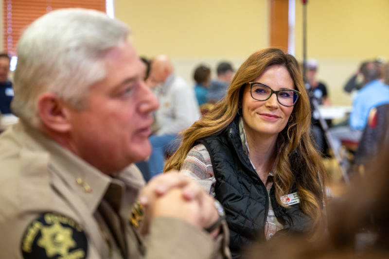 Commissioner Bobbie Daniel converses at Palisade Round Robin event. 