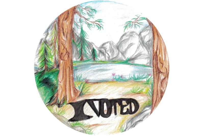 A sticker reading I Voted with a mountain landscape and a lake. 