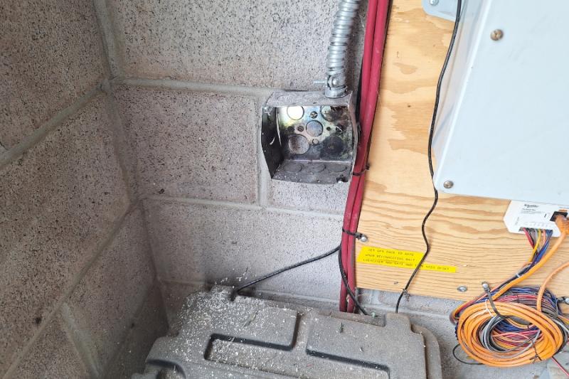 An electrical box with lightning strike damage. 
