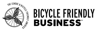 Wings in front of wheel stating Bicycle Friendly Business