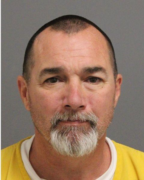 Adult male booking photo of Melvin Hunsberger. 
