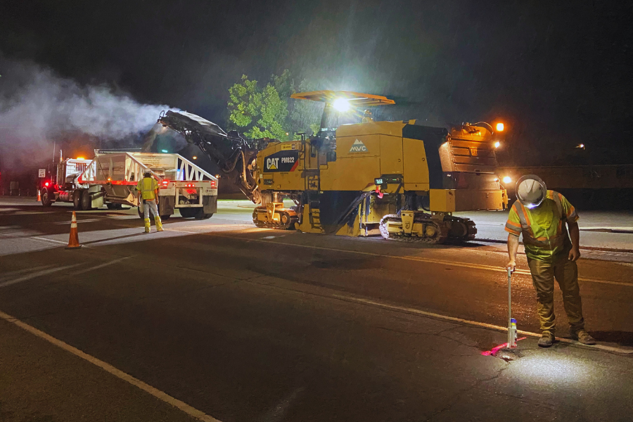 Construction crews with heavy equipment prepare to mill F Road. 