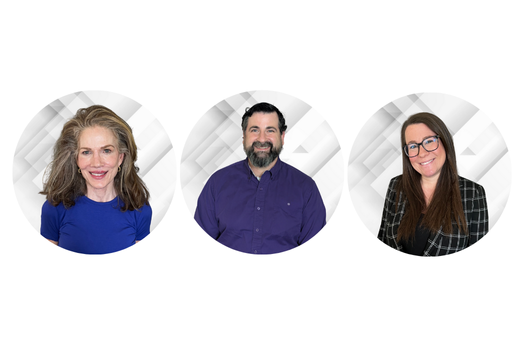 A woman in a blue shirt, a man with a beard in a purple shirt, and a woman with glasses in a black and white checkered blazer.