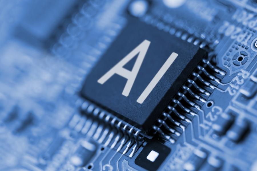 A key on a keyboard that reads, AI. 