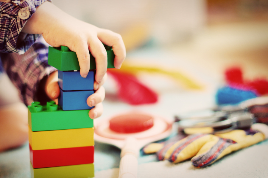 Child playing with building blocks.