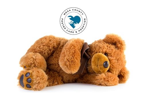 Teddy bear on white background with Foster/Adopt logo at the top.